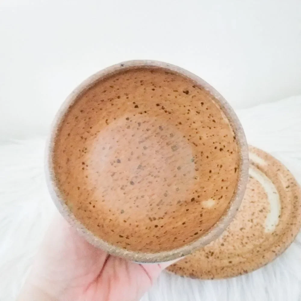 Pottery covered plate earth tones with blue